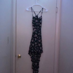 Xs dress, has a lace zip up back. it does have shorts on the inside.